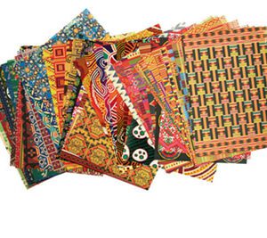 Photo of the paper sheets offered in the Around the World Paper Collection product. Each sheet of paper has a different geometric design.
