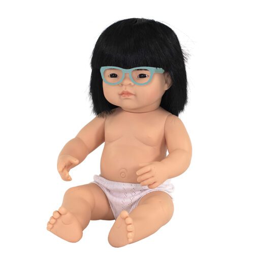 A Down Syndrome Asian girl doll with glasses