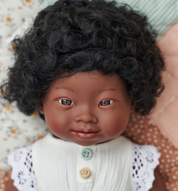 african american ethnic dolls with down syndrome close up