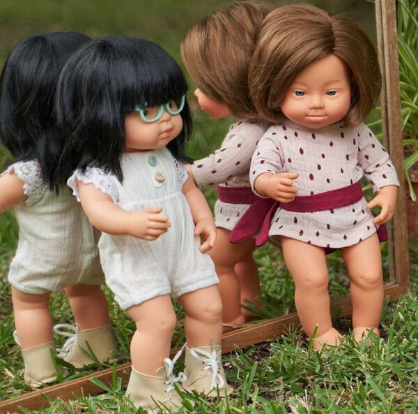 standing ethnic dolls with down syndrome