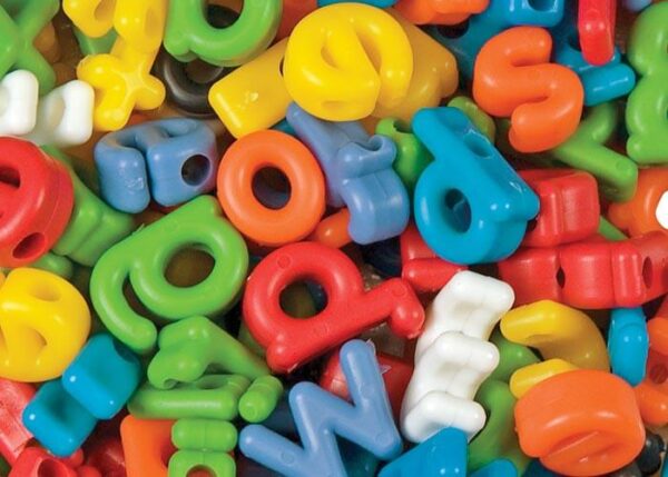 Close up photo of the Lowercase set of Alphabet Beads. This photo shows lowercase alphabet beads in bright colors including blue, red, orange, yellow, white, and green.