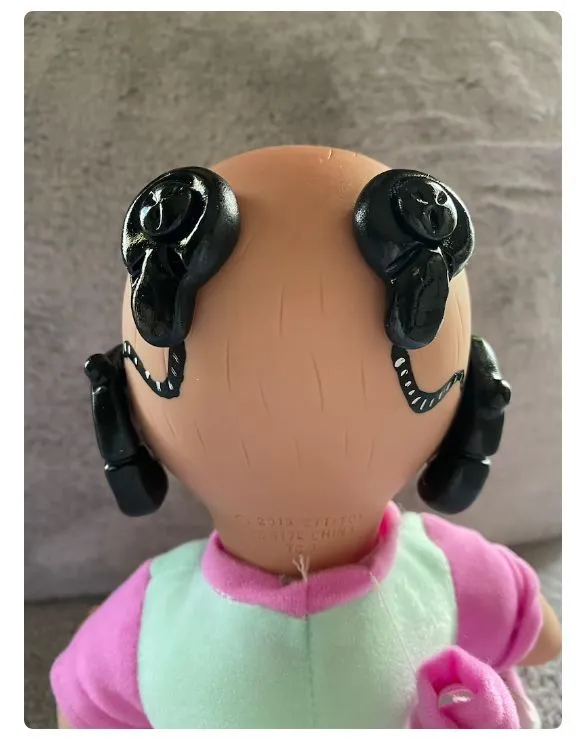 cochlear implant ethnic doll